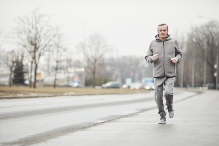 Ischias Man is aan het hardlopen en heeft ischias